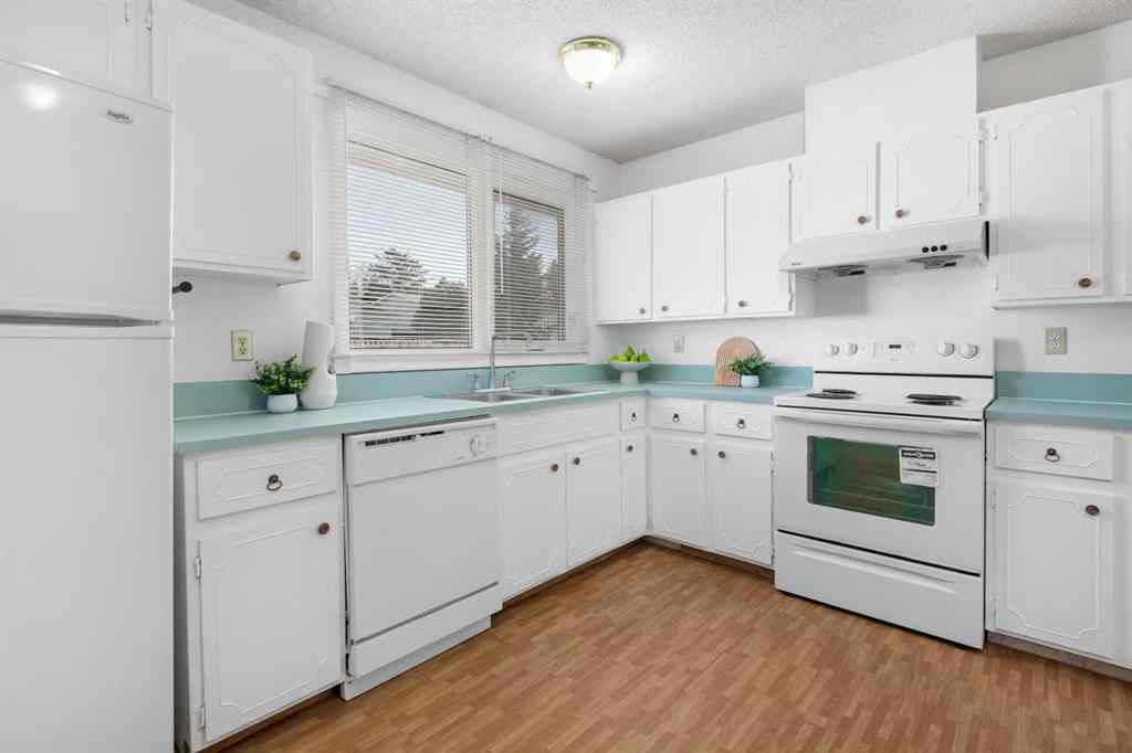 MLS® A2266895 - 228 Queensland Drive SE in Queensland Calgary, Residential