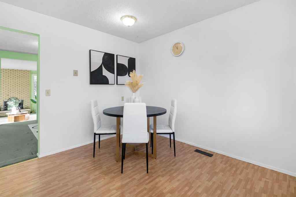 MLS® A2266895 - 228 Queensland Drive SE in Queensland Calgary, Residential