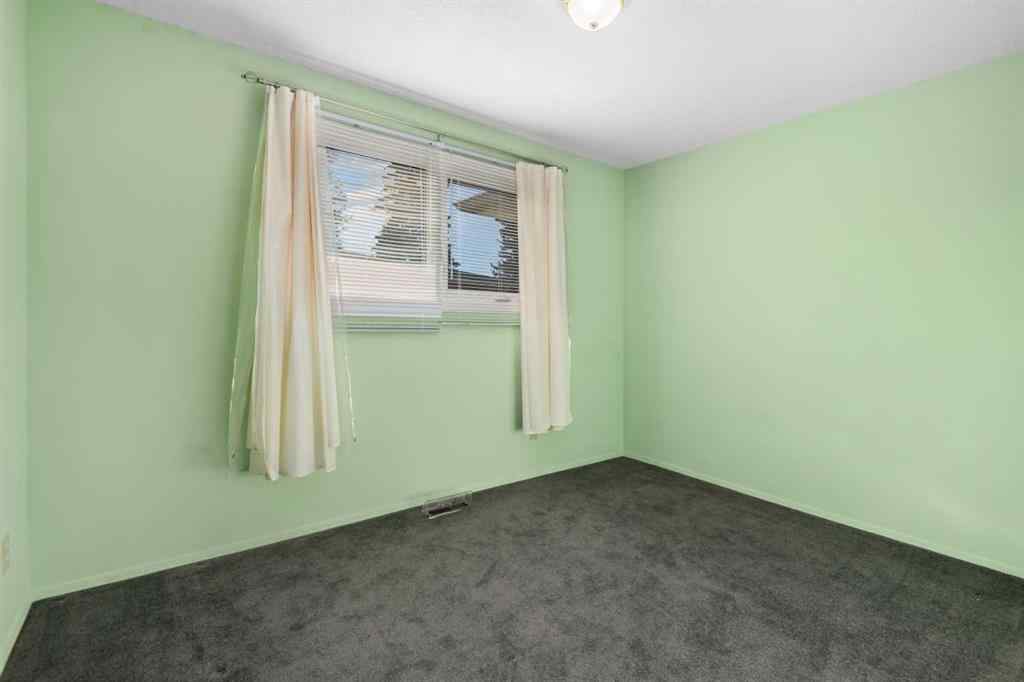 MLS® A2266895 - 228 Queensland Drive SE in Queensland Calgary, Residential