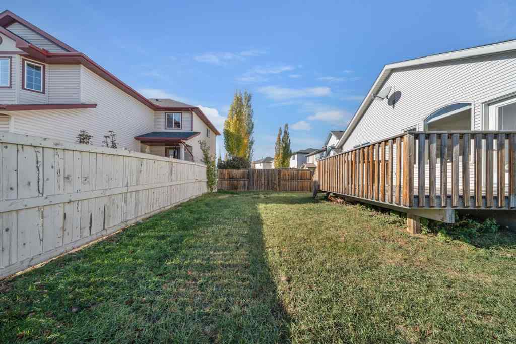 MLS® A2266914 - 111 Cimarron Park Circle  in Cimarron Park Okotoks, Residential