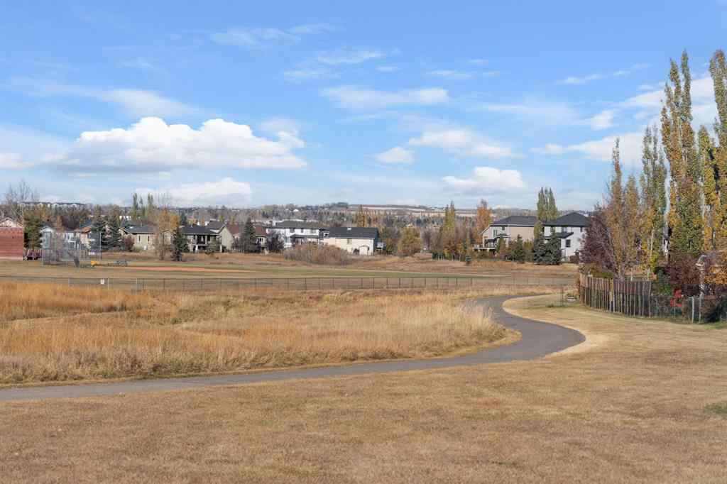 MLS® A2266914 - 111 Cimarron Park Circle  in Cimarron Park Okotoks, Residential