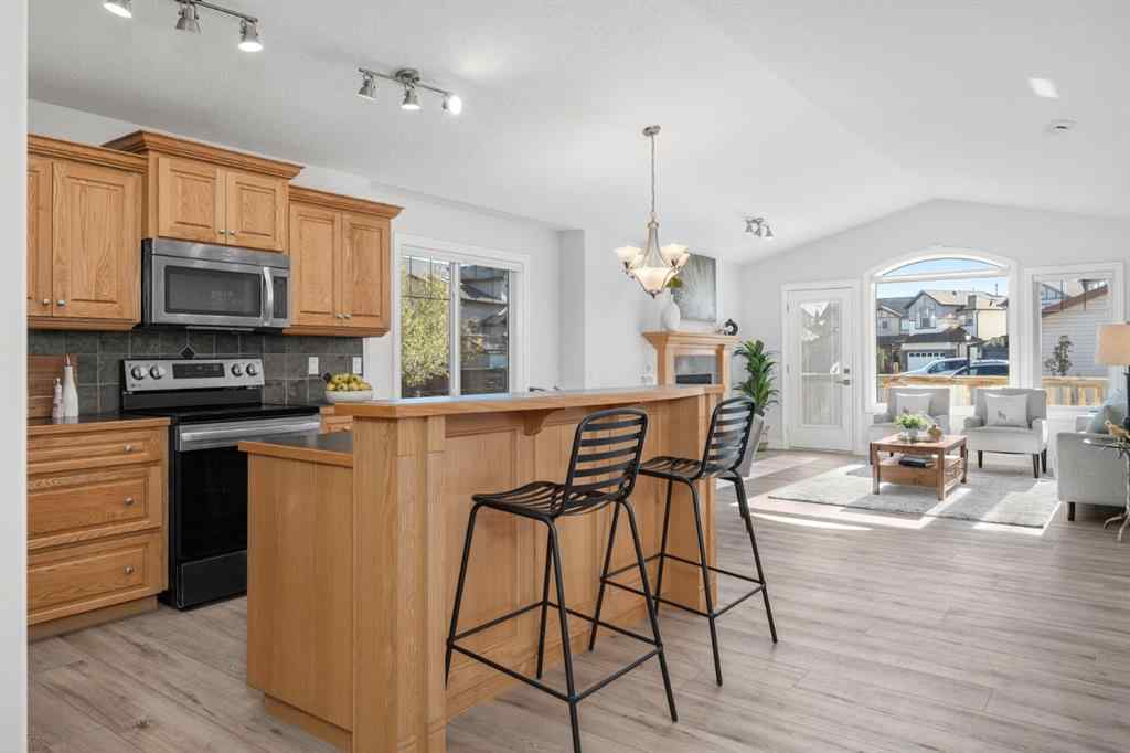 MLS® A2266914 - 111 Cimarron Park Circle  in Cimarron Park Okotoks, Residential