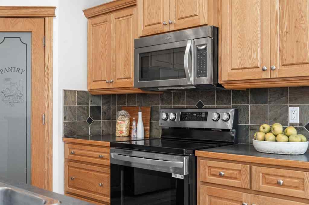 MLS® A2266914 - 111 Cimarron Park Circle  in Cimarron Park Okotoks, Residential