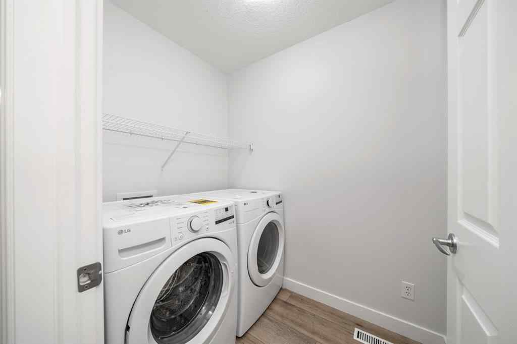 MLS® A2266914 - 111 Cimarron Park Circle  in Cimarron Park Okotoks, Residential