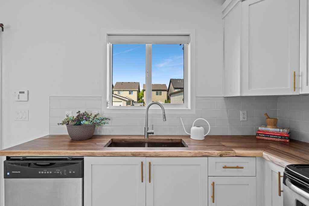 MLS® A2266917 - 2013 New Brighton Park SE in New Brighton Calgary, Residential