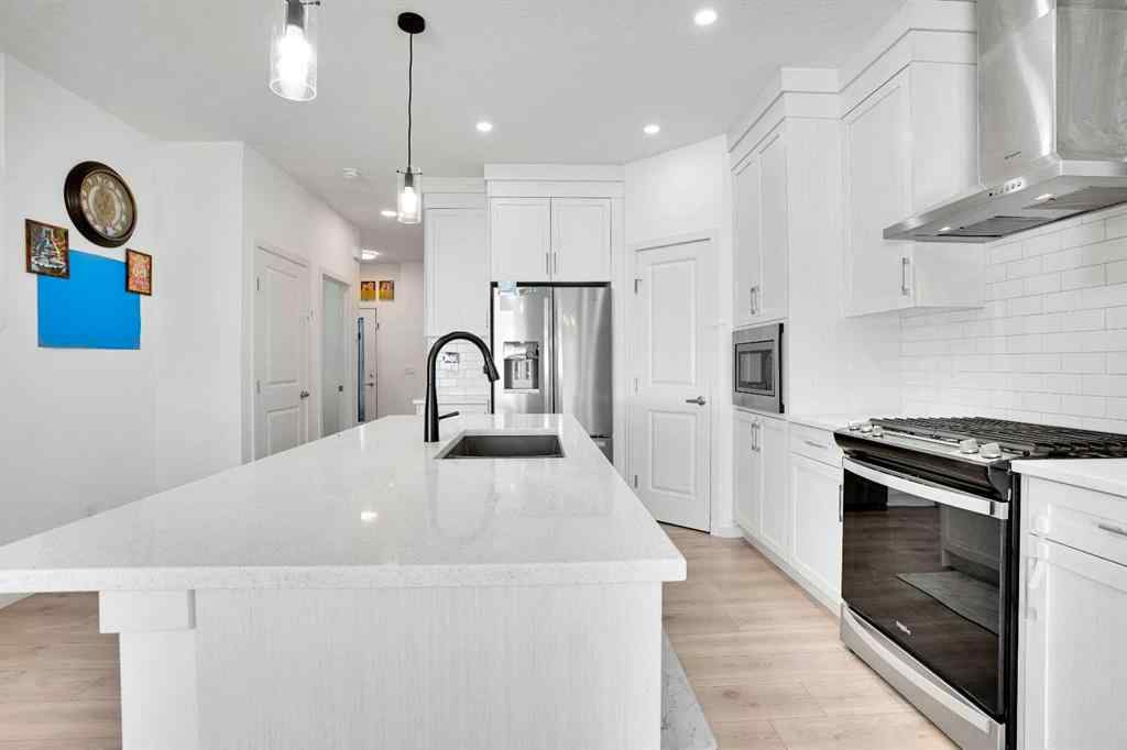 MLS® A2266938 - 1517 Bayview Point SW in Bayview Airdrie, Residential