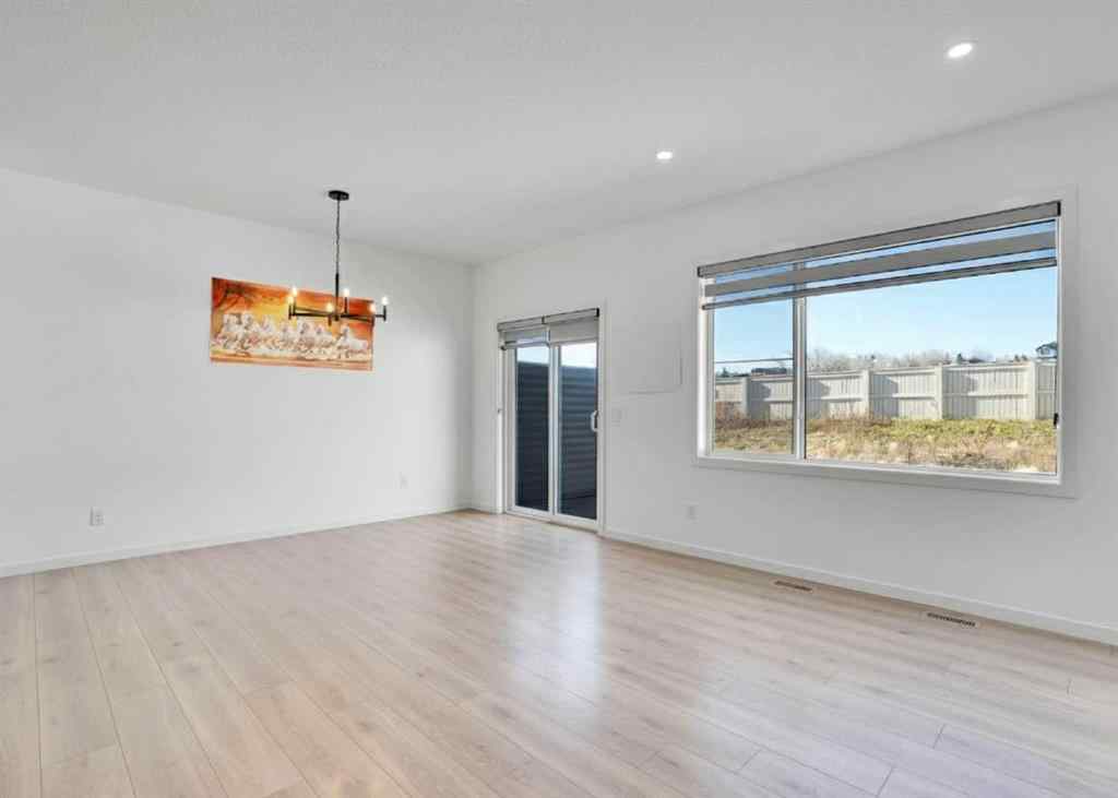 MLS® A2266938 - 1517 Bayview Point SW in Bayview Airdrie, Residential