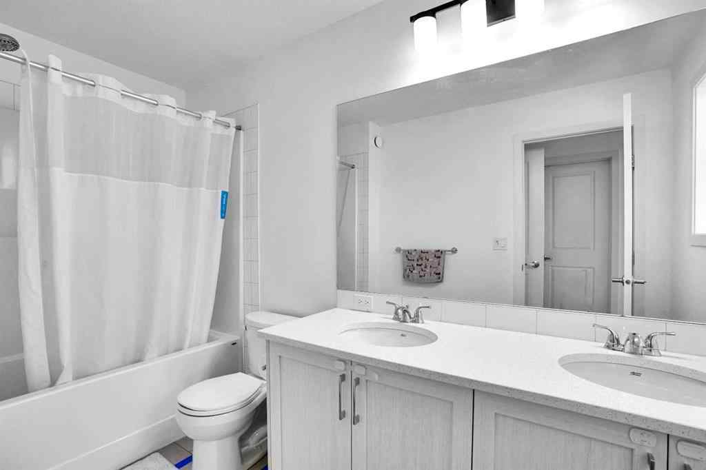 MLS® A2266938 - 1517 Bayview Point SW in Bayview Airdrie, Residential