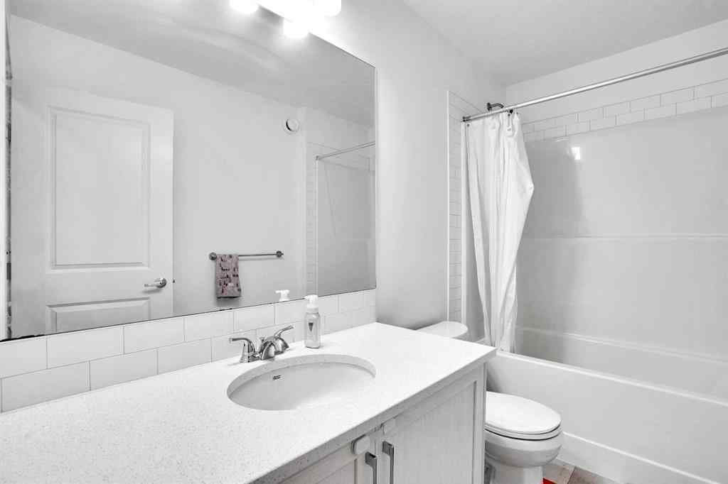 MLS® A2266938 - 1517 Bayview Point SW in Bayview Airdrie, Residential