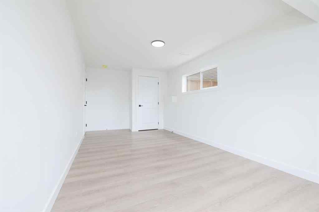 MLS® A2266940 - 208 Coopers Hill SW in Coopers Crossing Airdrie, Residential