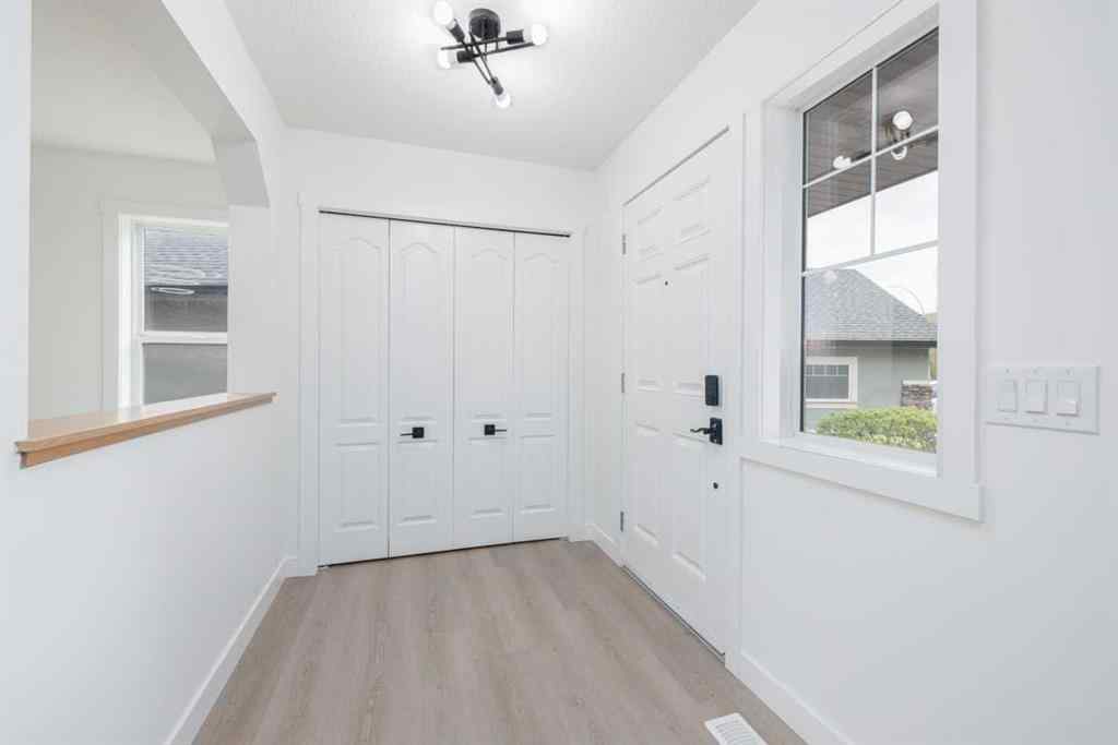 MLS® A2266940 - 208 Coopers Hill SW in Coopers Crossing Airdrie, Residential