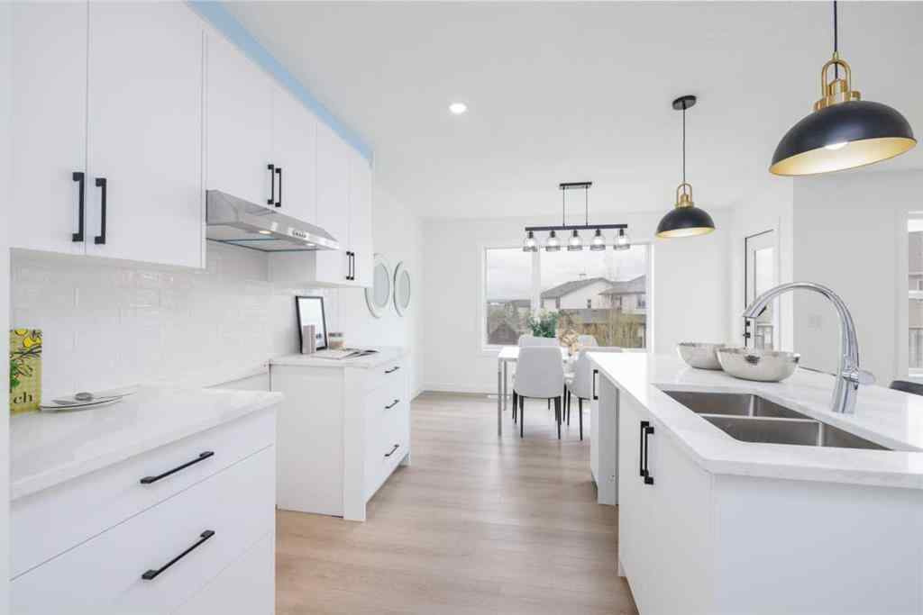 MLS® A2266940 - 208 Coopers Hill SW in Coopers Crossing Airdrie, Residential