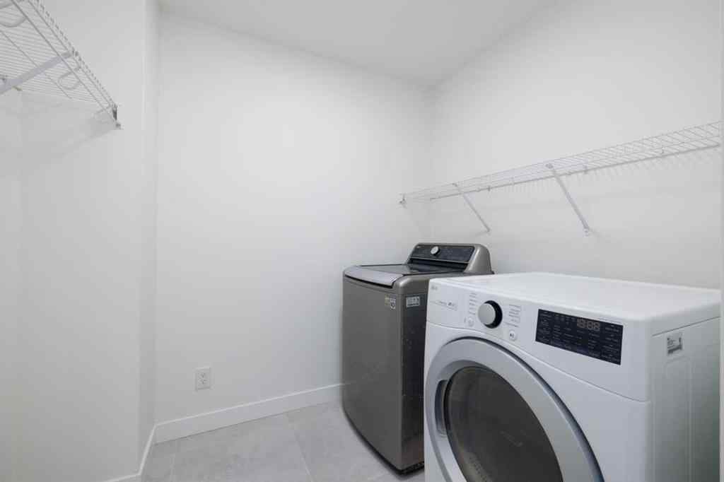 MLS® A2266940 - 208 Coopers Hill SW in Coopers Crossing Airdrie, Residential