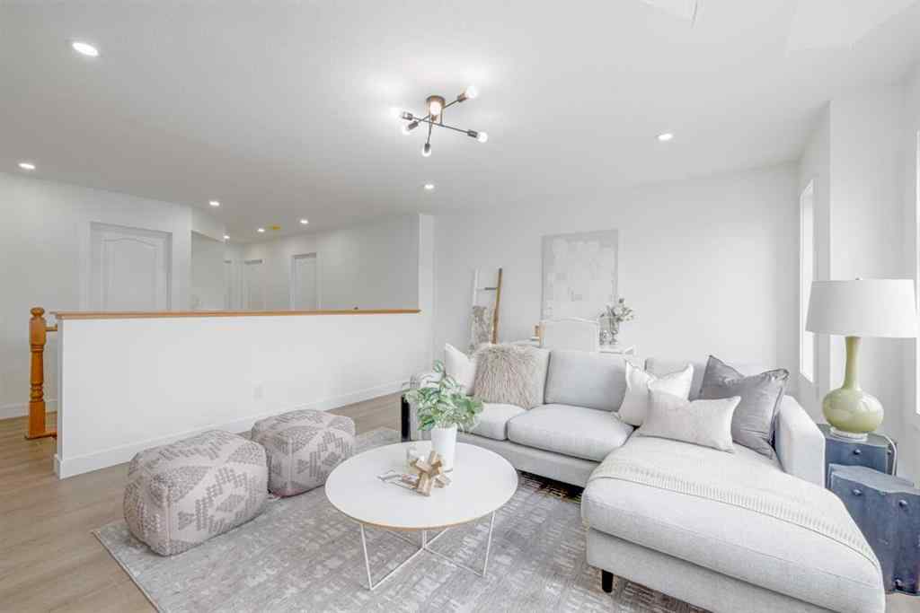 MLS® A2266940 - 208 Coopers Hill SW in Coopers Crossing Airdrie, Residential