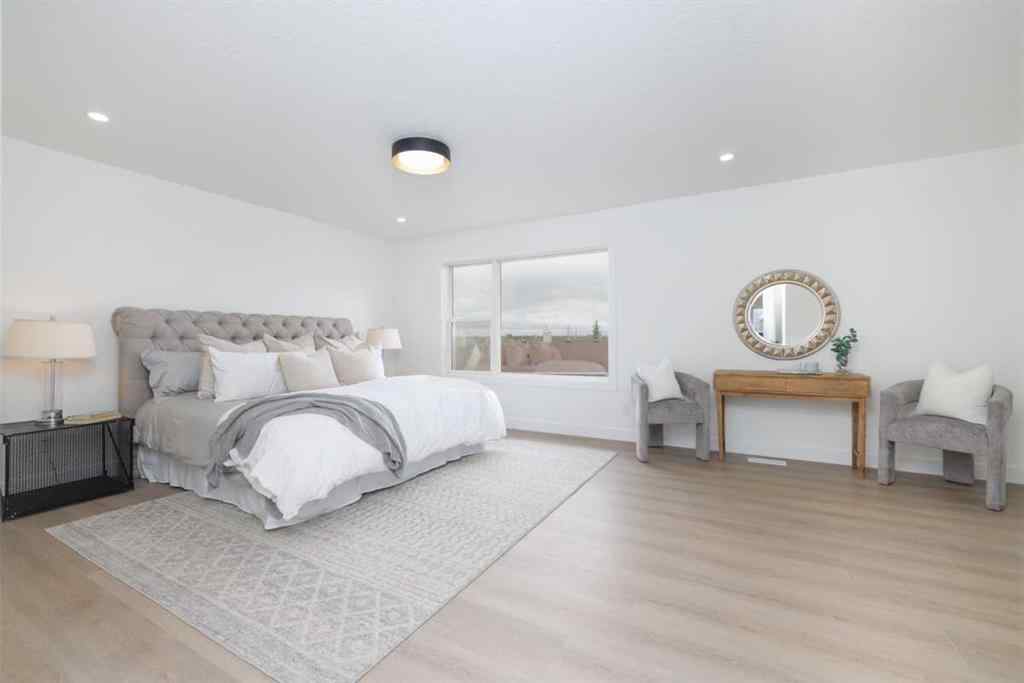 MLS® A2266940 - 208 Coopers Hill SW in Coopers Crossing Airdrie, Residential