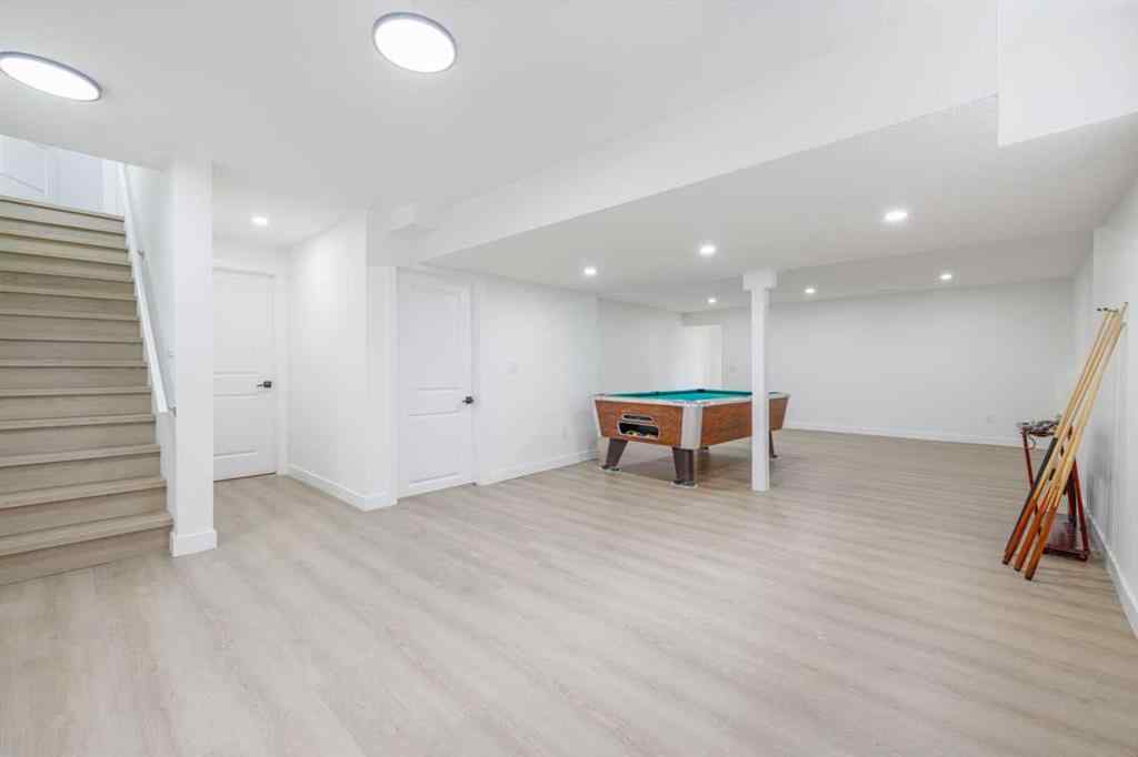 MLS® A2266940 - 208 Coopers Hill SW in Coopers Crossing Airdrie, Residential