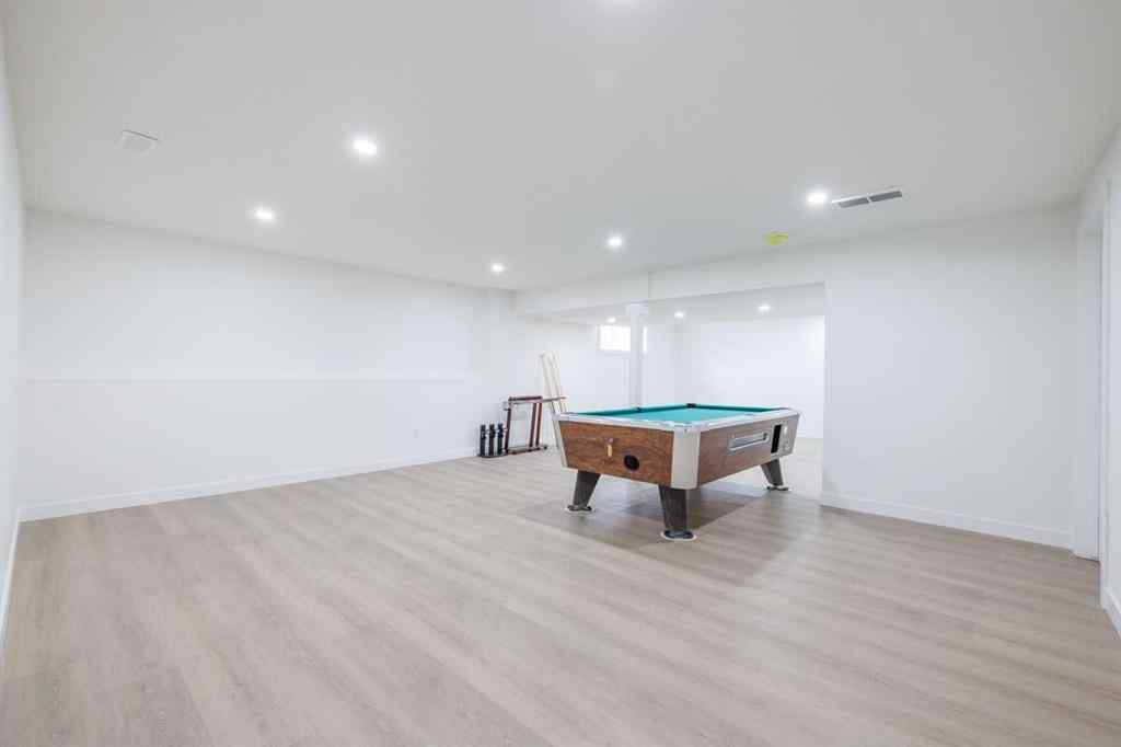 MLS® A2266940 - 208 Coopers Hill SW in Coopers Crossing Airdrie, Residential