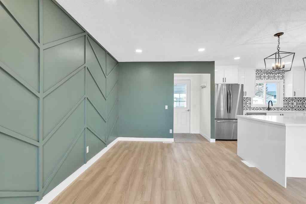 MLS® A2266957 - 220 60 Street SE in Penbrooke Meadows Calgary, Residential