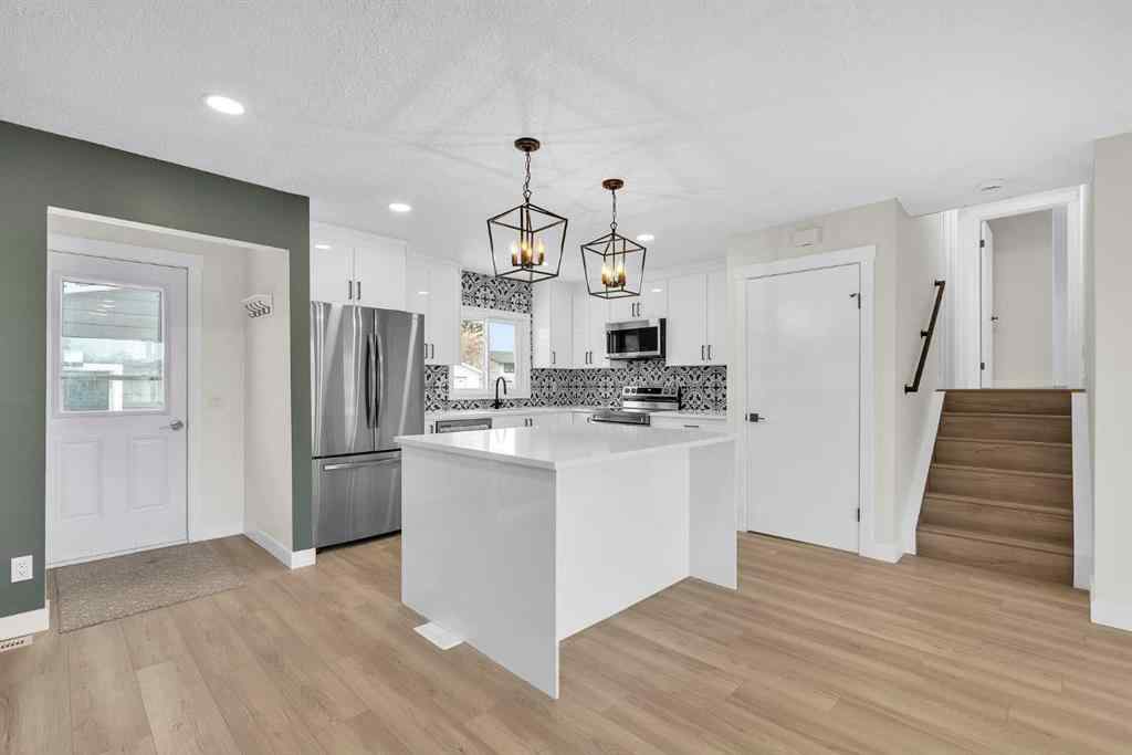 MLS® A2266957 - 220 60 Street SE in Penbrooke Meadows Calgary, Residential