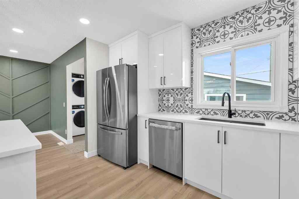 MLS® A2266957 - 220 60 Street SE in Penbrooke Meadows Calgary, Residential