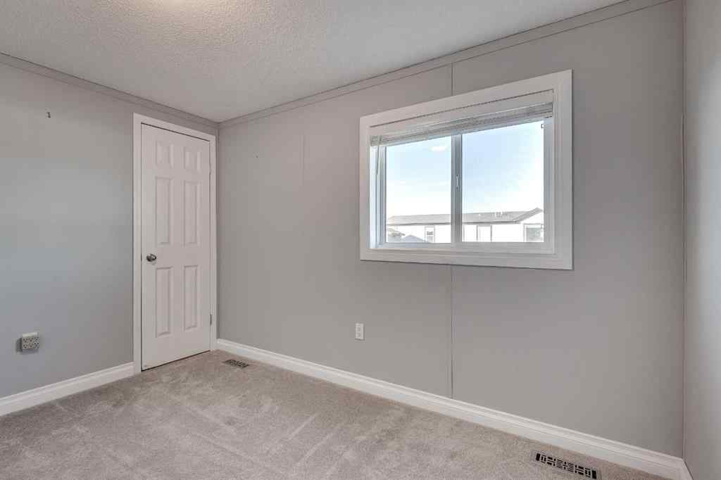 MLS® A2266960 - 18 McKay Place  in Mckay Ranch Blackfalds, Mobile