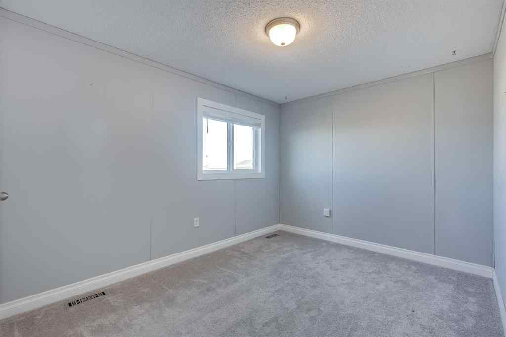 MLS® A2266960 - 18 McKay Place  in Mckay Ranch Blackfalds, Mobile