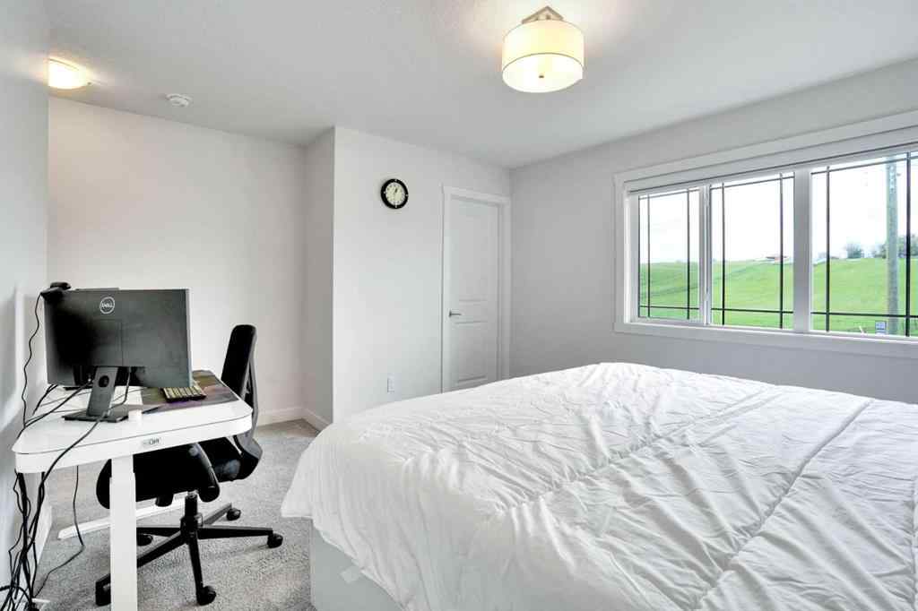 MLS® A2266964 - 1457 Bayview Point SW in Bayview Airdrie, Residential