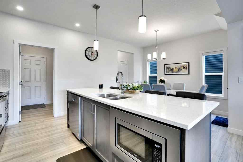 MLS® A2266964 - 1457 Bayview Point SW in Bayview Airdrie, Residential