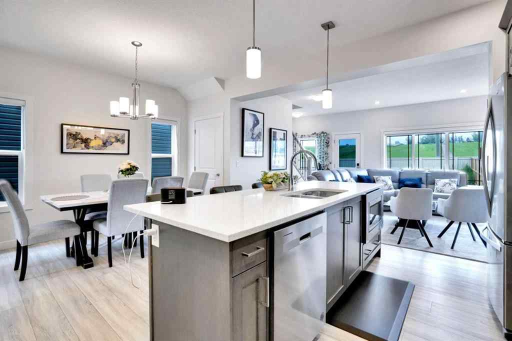 MLS® A2266964 - 1457 Bayview Point SW in Bayview Airdrie, Residential