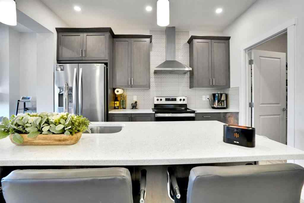 MLS® A2266964 - 1457 Bayview Point SW in Bayview Airdrie, Residential