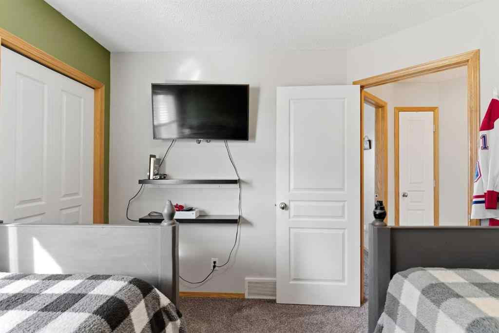 MLS® A2266972 - 314 River Heights Drive  in River Song Cochrane, Residential