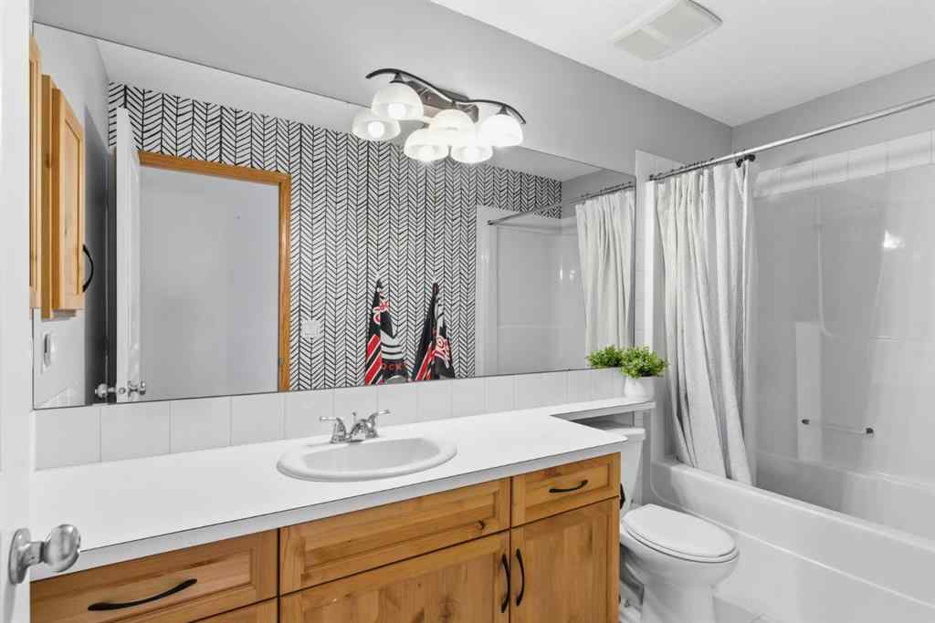 MLS® A2266972 - 314 River Heights Drive  in River Song Cochrane, Residential