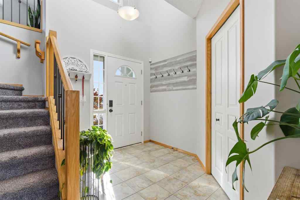 MLS® A2266972 - 314 River Heights Drive  in River Song Cochrane, Residential