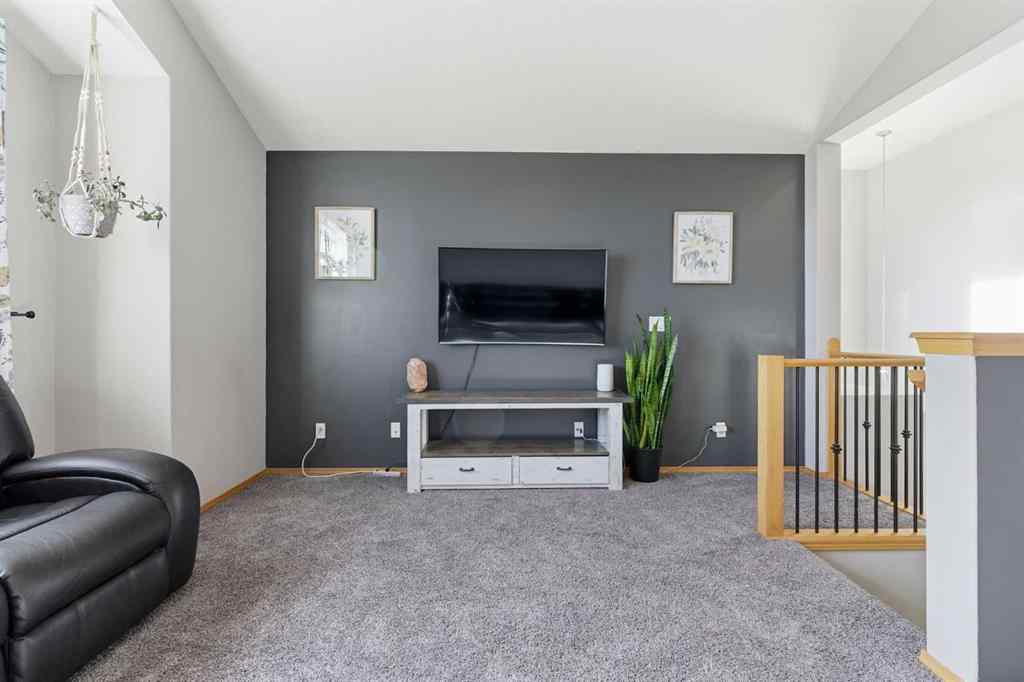 MLS® A2266972 - 314 River Heights Drive  in River Song Cochrane, Residential