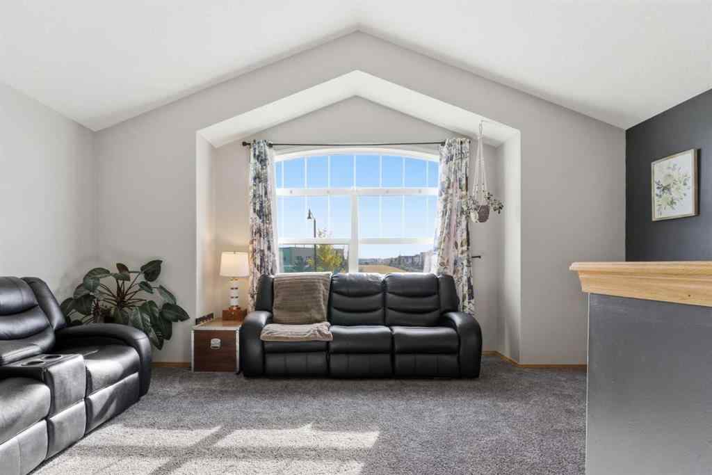 MLS® A2266972 - 314 River Heights Drive  in River Song Cochrane, Residential