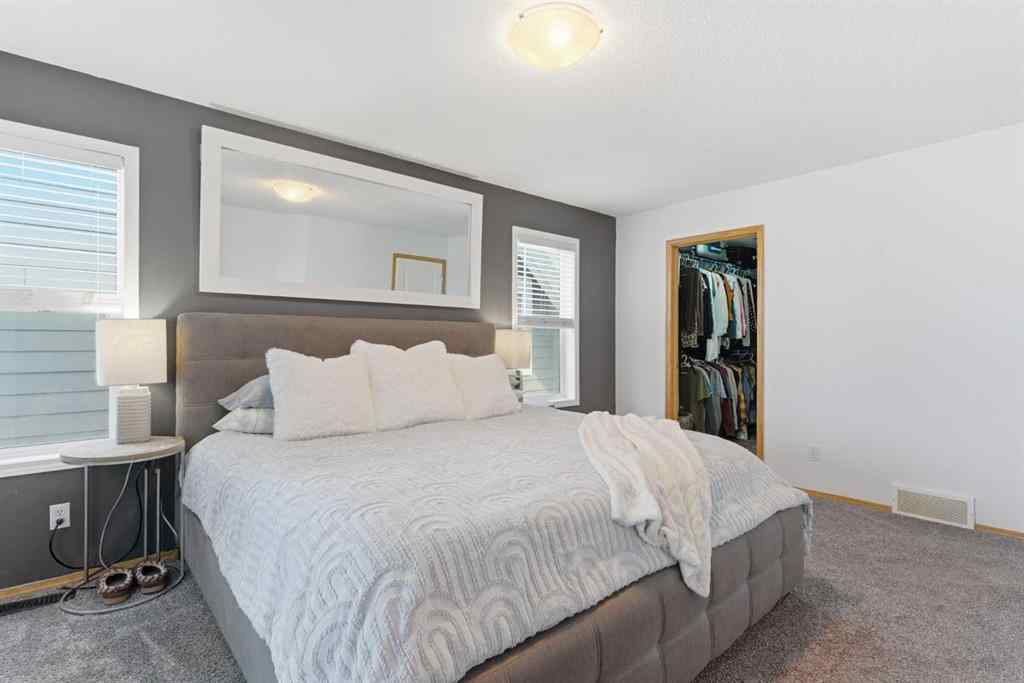 MLS® A2266972 - 314 River Heights Drive  in River Song Cochrane, Residential