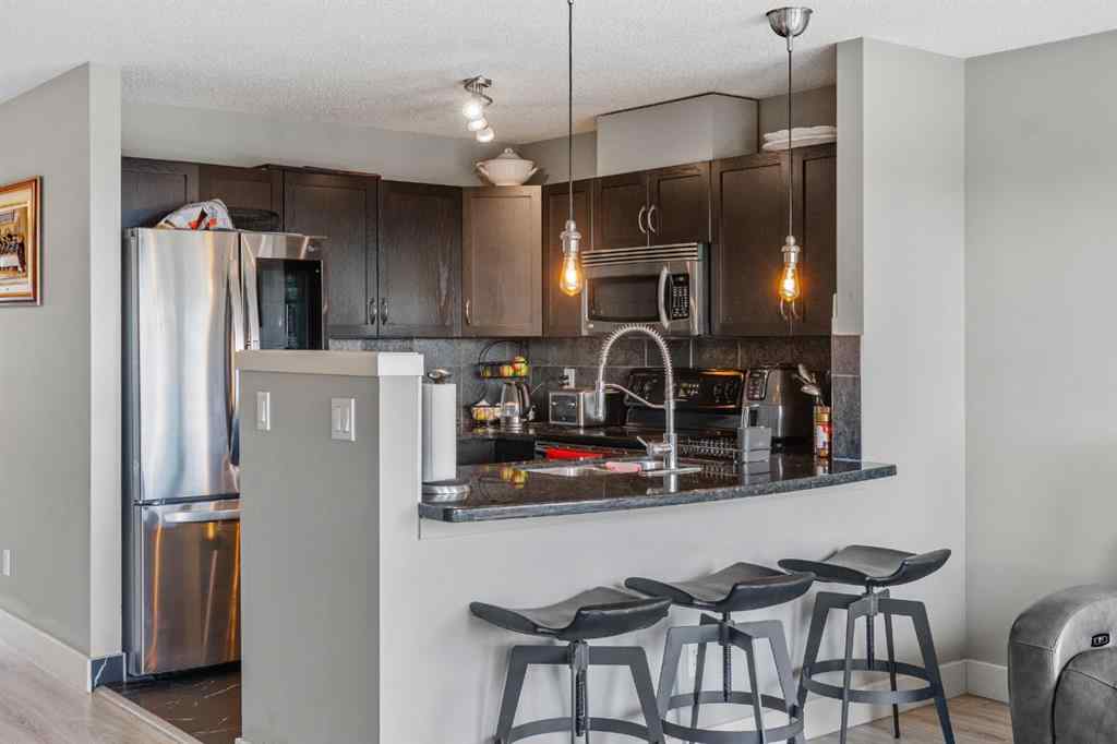 MLS® A2266973 - Unit #10 105 Village Heights SW in Patterson Calgary, Residential