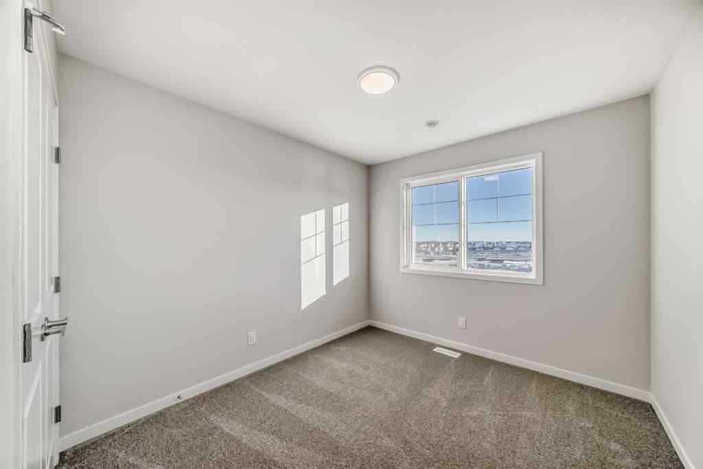 MLS® A2266975 - 1058 Sawgrass Link NW in Sawgrass Park Airdrie, Residential