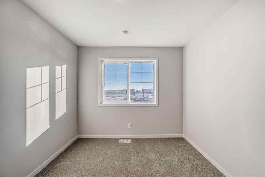 MLS® A2266975 - 1058 Sawgrass Link NW in Sawgrass Park Airdrie, Residential