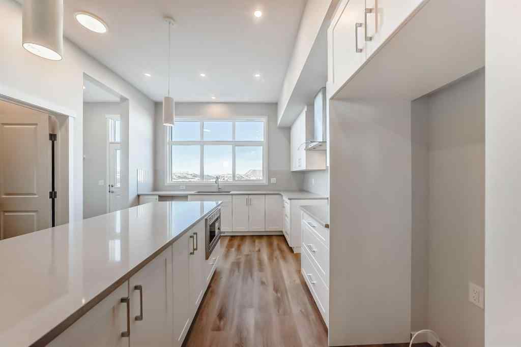 MLS® A2266975 - 1058 Sawgrass Link NW in Sawgrass Park Airdrie, Residential