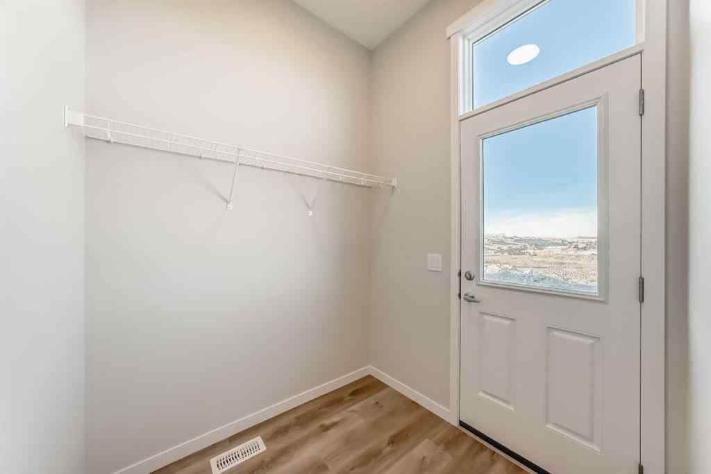 MLS® A2266975 - 1058 Sawgrass Link NW in Sawgrass Park Airdrie, Residential