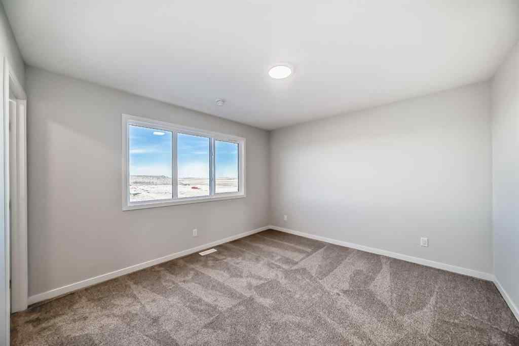MLS® A2266975 - 1058 Sawgrass Link NW in Sawgrass Park Airdrie, Residential
