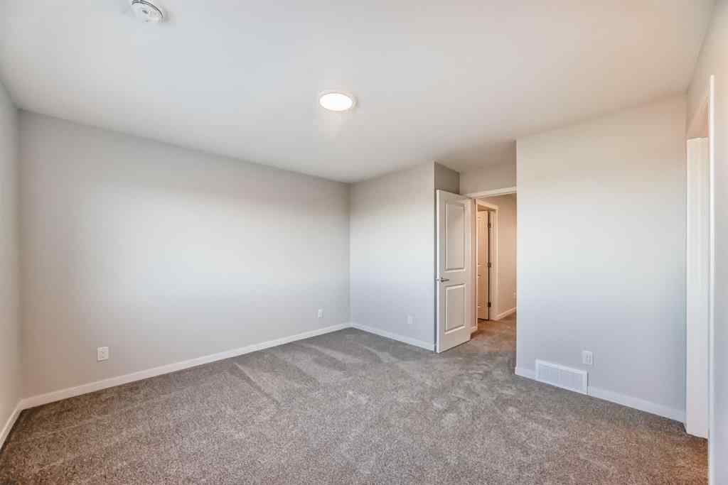 MLS® A2266975 - 1058 Sawgrass Link NW in Sawgrass Park Airdrie, Residential