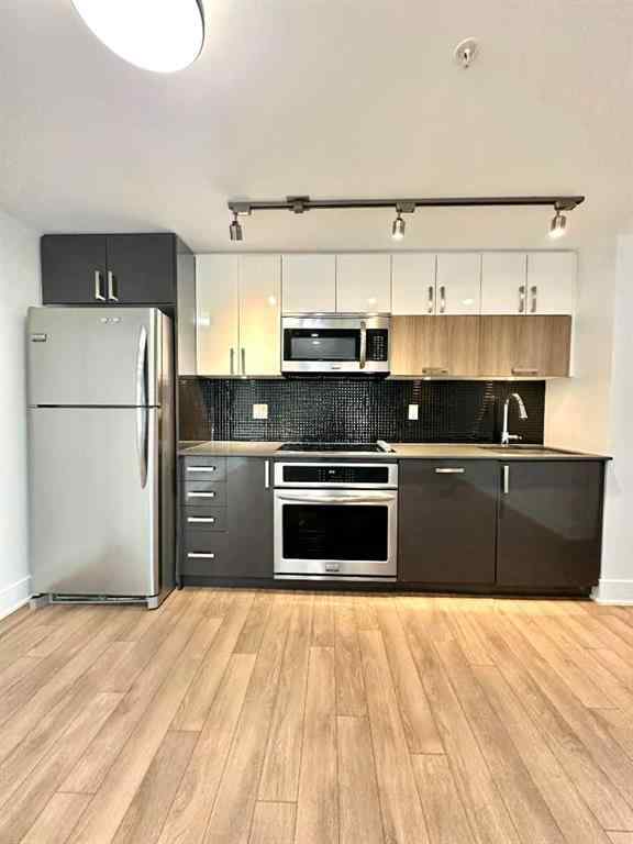MLS&reg; # A2266982 - 607 Confluence Way SE in Downtown East Village Calgary, Commercial Open Houses