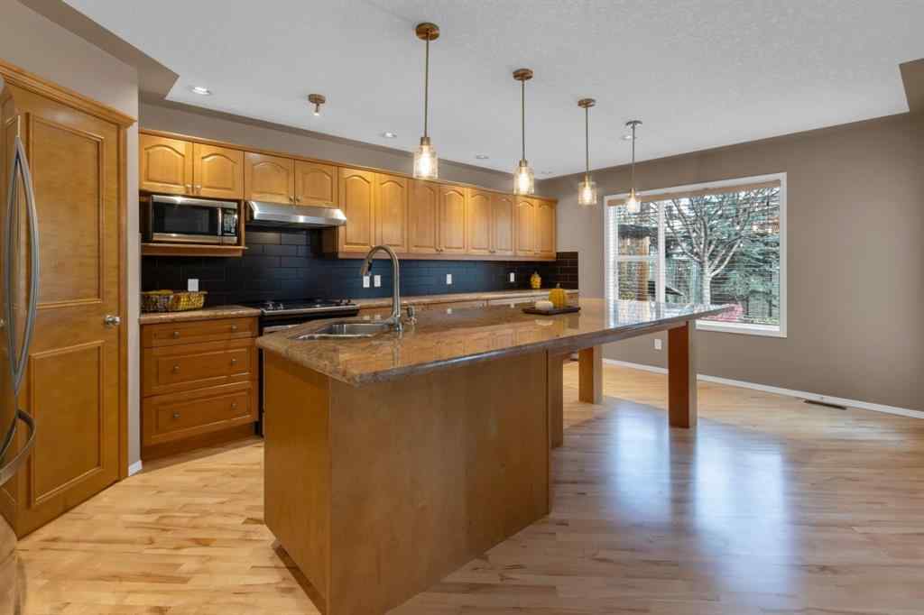 MLS® A2266992 - 26 Springbank Rise SW in Springbank Hill Calgary, Residential