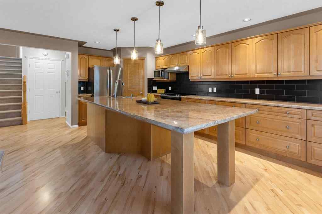 MLS® A2266992 - 26 Springbank Rise SW in Springbank Hill Calgary, Residential
