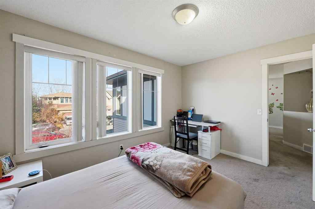 MLS® A2267001 - 217 coopers Grove SW in Coopers Crossing Airdrie, Residential