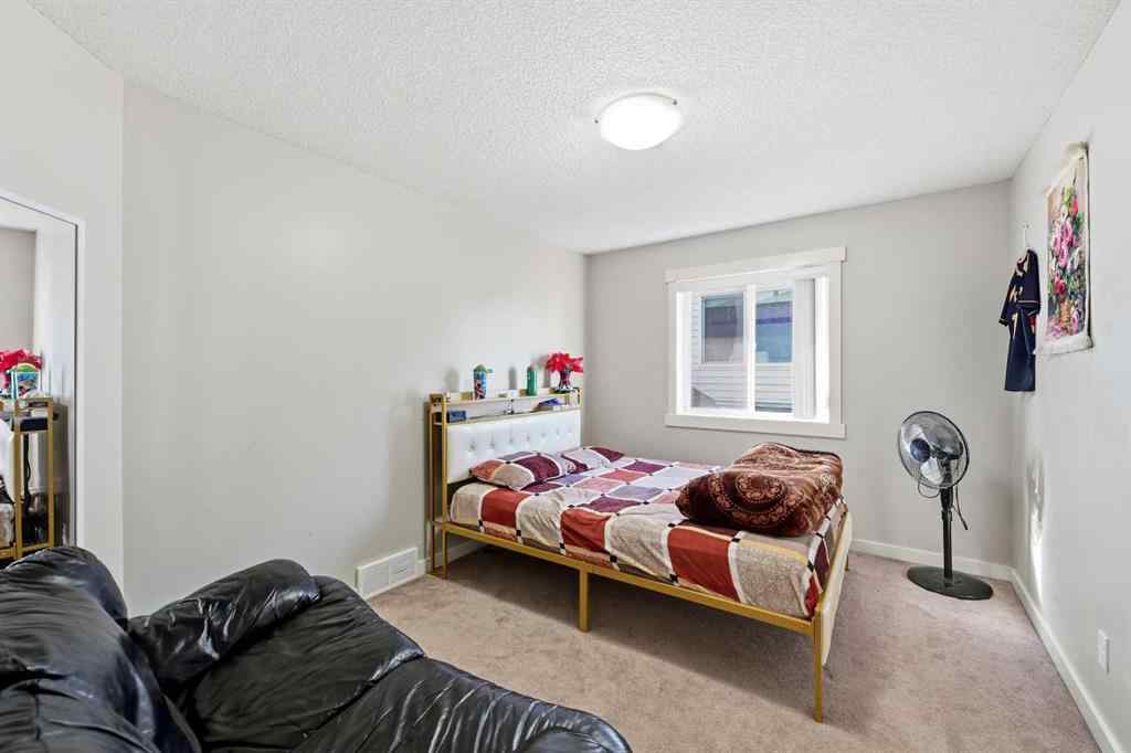 MLS® A2267001 - 217 coopers Grove SW in Coopers Crossing Airdrie, Residential