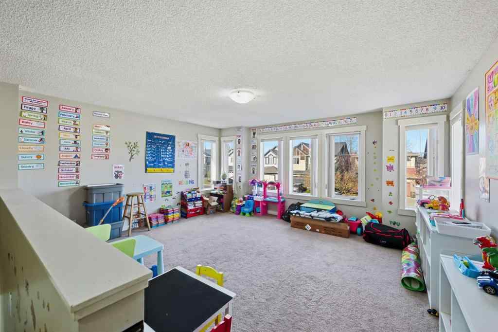 MLS® A2267001 - 217 coopers Grove SW in Coopers Crossing Airdrie, Residential