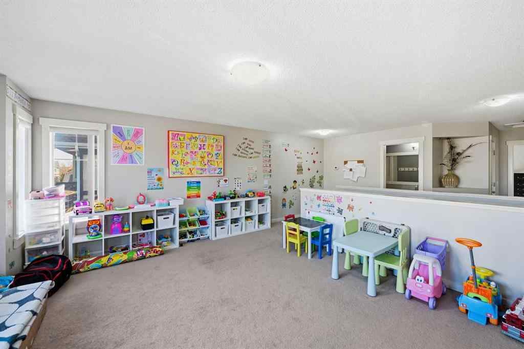 MLS® A2267001 - 217 coopers Grove SW in Coopers Crossing Airdrie, Residential